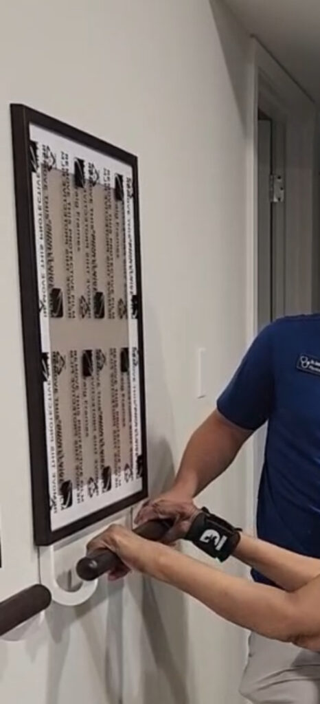 Picture frame grab bar with hands on grab bar