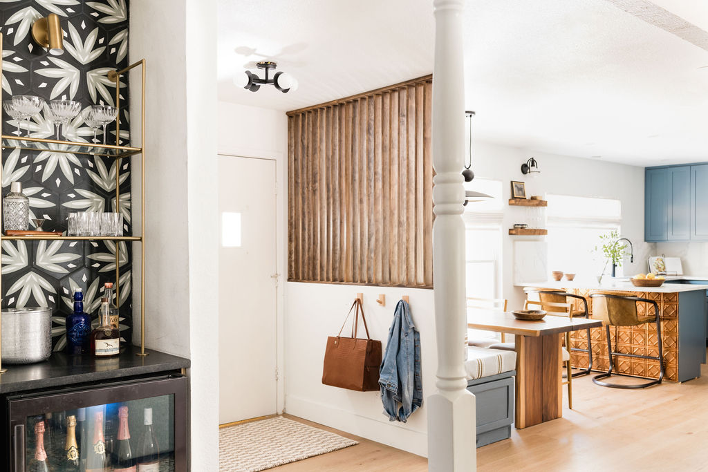 Open concept entryway, kitchen and dining room.